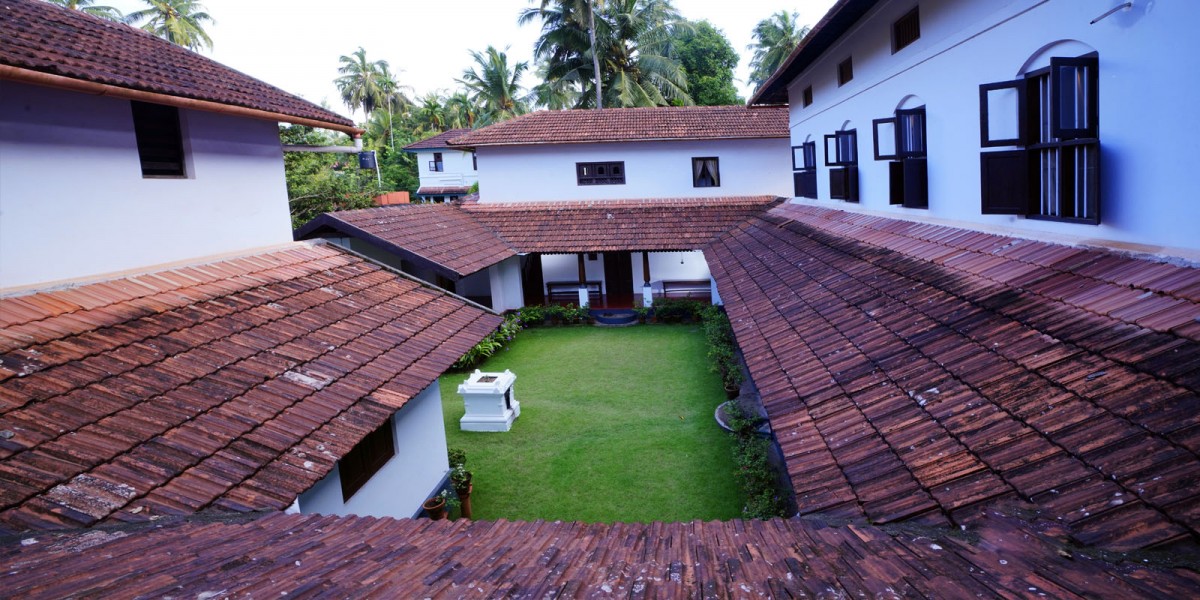 The calm, tree-lined grounds of Vaidyagrama — an Ayurveda healing village on the outskirts of Coimbatore, Tamil Nadu